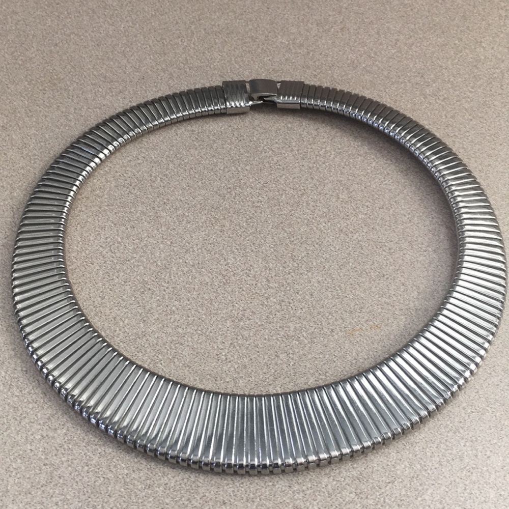 Silver tone necklace. Very trendy.